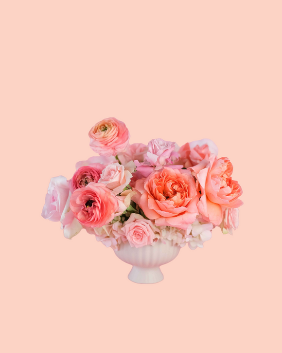 petite flower arrangement filled with all-pink blooms